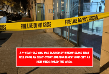 A 9-year-old girl was injured by window glass that fell from an eight-story building in New York City as high winds roiled the area.